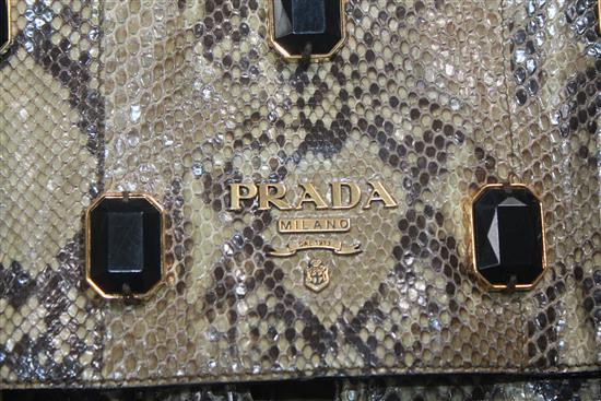 A Prada snakeskin and jewelled bag,